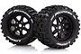Two Louise 3.8 inch MT-Pioneer monster truck wheels with black rims and aggressive tread patterns, featuring white branding on the sidewalls.