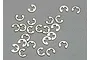 A collection of small silver-coloured metal E-clips scattered on a grey surface.