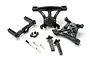 Traxxas body mount set including various black plastic mounting brackets, posts, and small metal screws on a white background.
