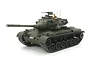 A fully assembled and painted 1/35 scale Tamiya German M47 Patton tank model with a crew figure in the turret hatch.