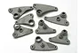A set of eight grey plastic Traxxas progressive rocker arms for RC vehicles, arranged on a white background.