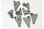 A collection of eight grey plastic Traxxas progressive rocker arms arranged on a white background.