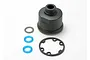 Traxxas differential case set including a black plastic housing, a circular gasket, and three small O-rings on a white background.