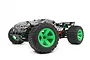 Maverick Quantum XT Flux 1/10 scale RC truggy in silver and green with black accents, shown from a low angle against a white background.