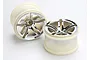 Two Traxxas 2.8-inch twin-spoke RC truck rims with a chrome finish and off-white plastic barrels.