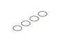Four thin, flat, circular steel washers arranged in a diagonal line against a white background.
