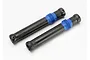 Two black Traxxas splined half shafts with blue rubber dust boots on a white background.