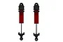 Two ARRMA 1/5 8S BLX rear shock absorbers with red bodies and black plastic components against a white background.
