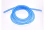 A coil of translucent blue silicone water cooling tubing for RC boats on a white background.