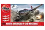 Airfix 1/48 scale North American F-51D Mustang model kit box art featuring a silver fighter plane flying over tanks in a battlefield.