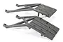 Two black plastic Traxxas front and rear skid plates for RC vehicles shown against a white background.
