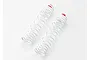 Two white Traxxas Big Bore progressive shock springs with red markings on a white background.
