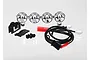 Traxxas 1/10 LED light bar kit including a four-lamp chrome housing, wiring harness with red connectors, mounting brackets, and small black screws.