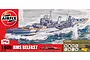 Airfix 1/600 scale HMS Belfast model kit box art showing the cruiser at sea with included paints, brushes, and cement.