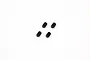 Four small black metal grub screws arranged in a square pattern on a white background.