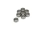 A set of eight small silver metal ball bearings arranged in a cluster on a white background.