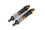 Two assembled RC shock absorbers with black bodies, silver shafts, and gold-coloured adjustment collars on a white background.