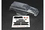 A clear, unpainted polycarbonate body shell for the Traxxas 1/16 Summit RC truck, shown with an included decal sheet on a black background.