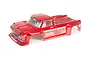 Metallic red ARRMA Outcast 8S RC truck body shell with wood-grain side decals on a white background.