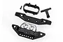 Traxxas front and rear bumper set including a black plastic bumper with chrome light buckets, a secondary black bumper, and mounting brackets.