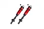 Two red and black aluminium RC shock absorbers with black rubber dust boots and mounting hardware on a white background.