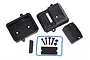 Traxxas sealed receiver box set including black plastic housing components, a blue rubber gasket, screws, and foam padding on a white background.