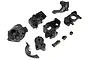 A set of black plastic transmission case parts for an Axial RC vehicle, including housing halves, covers, and small mounting components.