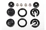 A set of black plastic Traxxas GTR shock caps, spring retainers, and metal pivot balls arranged on a white background.