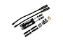 Two black Yeah Racing Desert Lizard 100mm RC shock absorbers with remote piggyback reservoirs, mounting hardware, and O-rings on a white background.