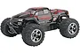 HPI Savage XS Flux 1/12 scale RC truck in black and red with chrome wheels, studio shot.