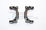 Two black aluminium GPM Racing C-hub steering carriers for an RC car, shown against a white background.