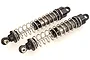 Two assembled RC shock absorbers with black plastic ends and silver metal springs against a white background.