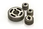 A set of four metal transmission gears of varying sizes arranged on a white background.