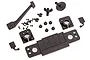 A collection of black plastic RC car body accessories including a grille, mirrors, mounts, and various small screws on a white background.