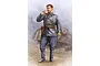 Digital painting of a Soviet WWII tank crewman in uniform smoking a cigarette, standing in front of a tank.