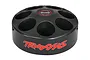A black Traxxas spinning carousel rack for shock oils with multiple circular slots and the Traxxas logo printed on the side and top.