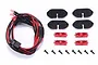 GPM Racing red LED chassis light set for SCX10 III including four LED bulbs, mounting brackets, red lenses, and mounting screws.