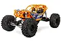 Axial RBX10 Ryft 4X4 rock bouncer RC car in orange with black off-road tires, shown from a front three-quarter angle against a white background.