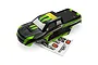 Black and green pre-painted RC truck body shell for BlackZon Slayer with included decal sheet on a white background.