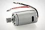 A silver 390-size brushed RC motor with a metal pinion gear attached to the shaft and red and black wires with bullet connectors.