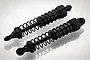 Two black RC shock absorbers for the BlackZon 1/12 Warrior, featuring coil springs and plastic bodies, isolated on a white background.