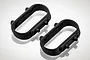 Two black plastic oval-shaped bumper mounts for BlackZon 1/12 RC cars, shown from a high angle on a white background.