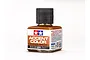 A 40ml bottle of Tamiya Orange-Brown Panel Line Accent Color enamel paint with a black cap against a white background.