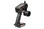 Spektrum DX5 Pro 2.4GHz 5-channel RC transmitter in black with a steering wheel and LCD screen.