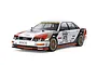 A 1/10 scale Tamiya TT-02 RC car featuring a white, red, and brown 1991 Audi V8 DTM racing livery with gold BBS-style wheels on a white background.