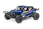 A blue Maverick Strada DT 1/10 scale desert truck RC body shell with black accents, racing decals, and two driver figures, shown on a white background.