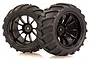 Two black RC monster truck wheels with V-groove tread patterns and 10-spoke black rims, shown against a white background.