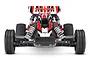 Front view of a Traxxas Bandit 1/10 scale RC buggy with a red, white, and black body shell and rear wing.