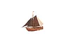 A completed wooden model of a 1912 Dutch Zuiderzee Botter fishing boat with dark brown sails and a wooden hull.