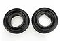 Two black Traxxas 2.2 inch Alias front buggy tyres with grey foam inserts, viewed from the side on a white background.